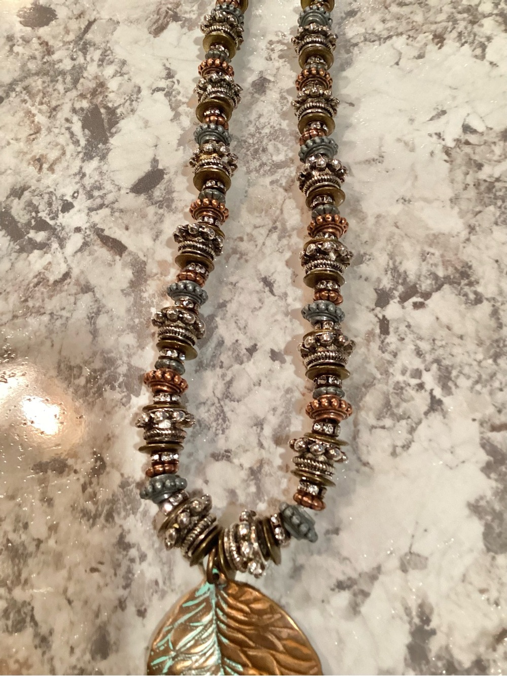 Artisan Crafted Bohemian Brown and Turquoise Metal Leaf Pendant Necklace - Picture 6 of 7